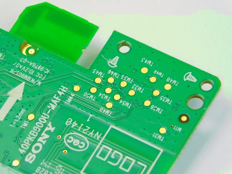 Green PCB with yellow vias