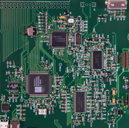 Green  PCB showing high component density