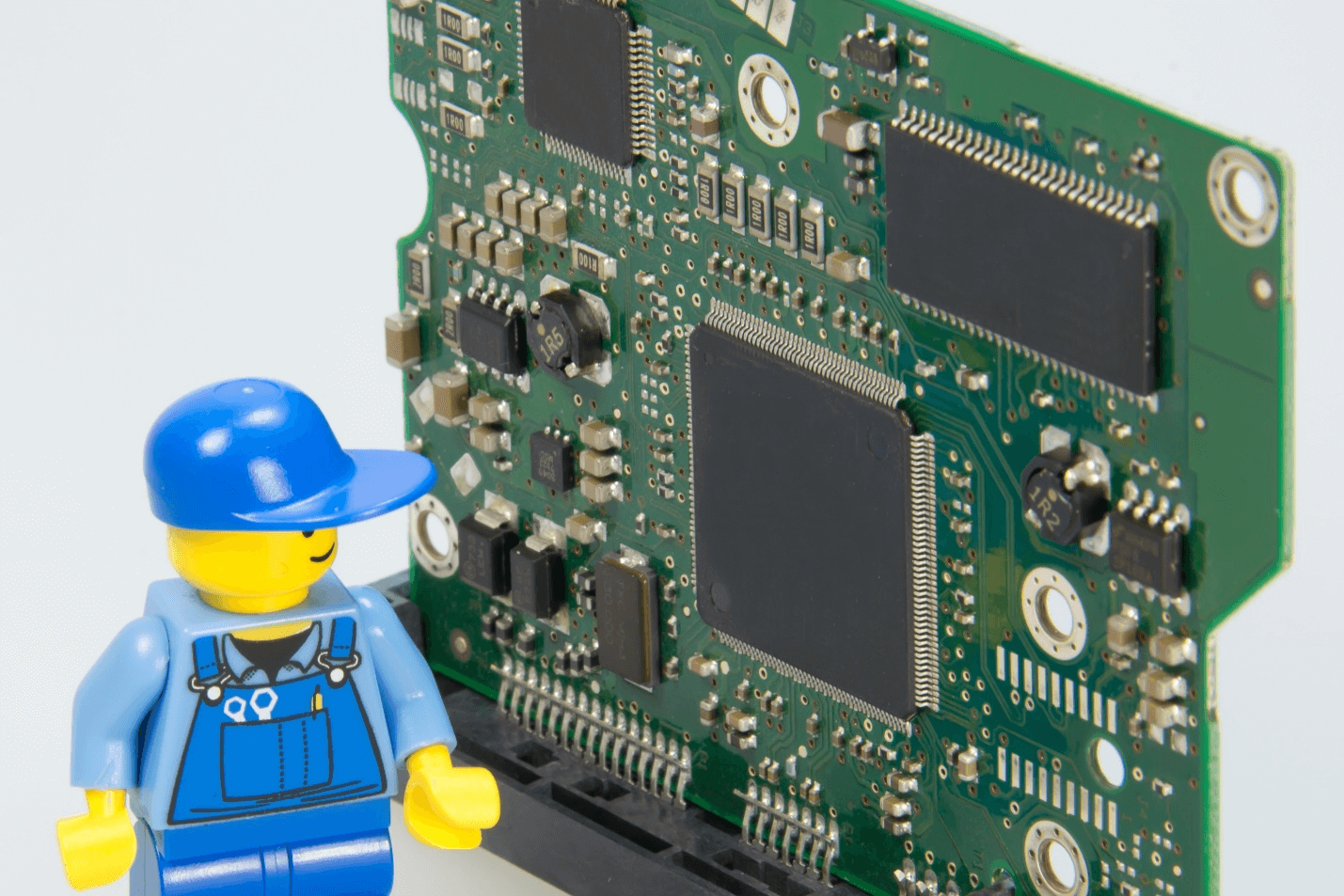 Lego figure with circuit board components.