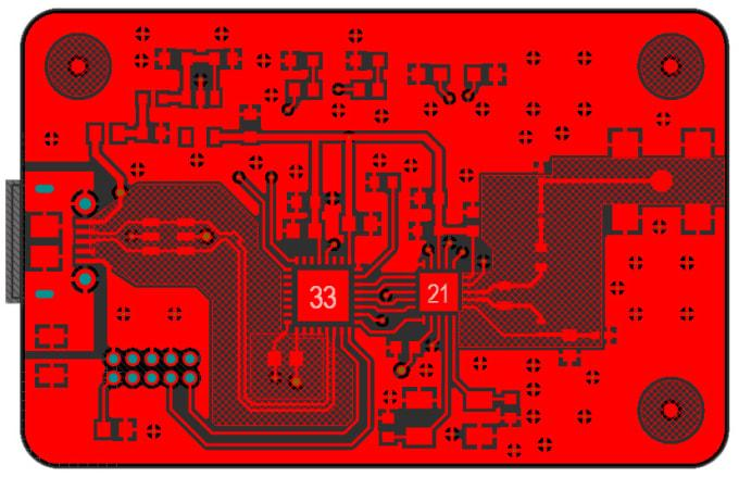 A detailed view of a red printed circuit board (PCB) shows a clean layout with black components, numbers 21 and 33.
